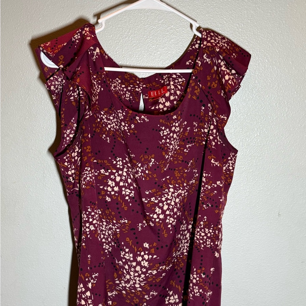 Elle Violet Floral Ruffle Sleeve Blouse with keyhole button back.